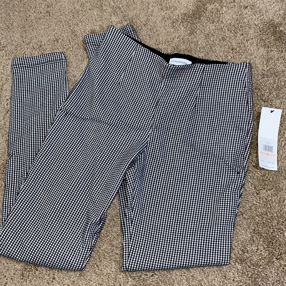 Calvin Klein skinny slacks.